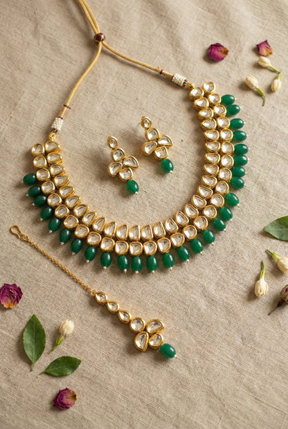 Main display view of the traditional Anika Premium Kundan Necklace with Maang Tika