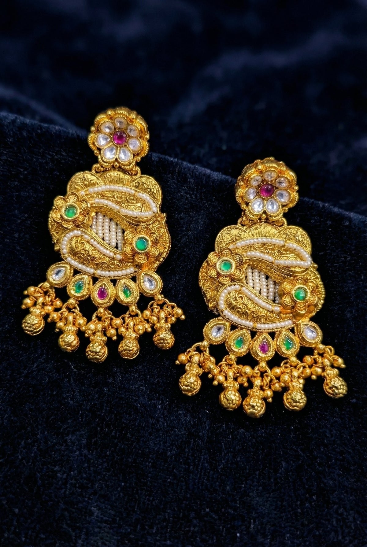 Matching traditional antique gold earrings from the Nalima Heritage jewelry set